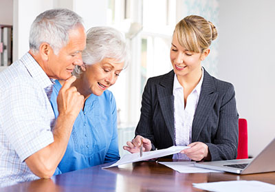 Insurance agent explaining to insureds